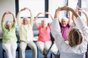 Seniors doing exercises
