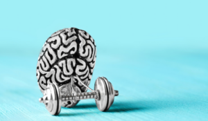 Metallic brain with hand weights on blue background for brain pacemaker Parkinson's article.