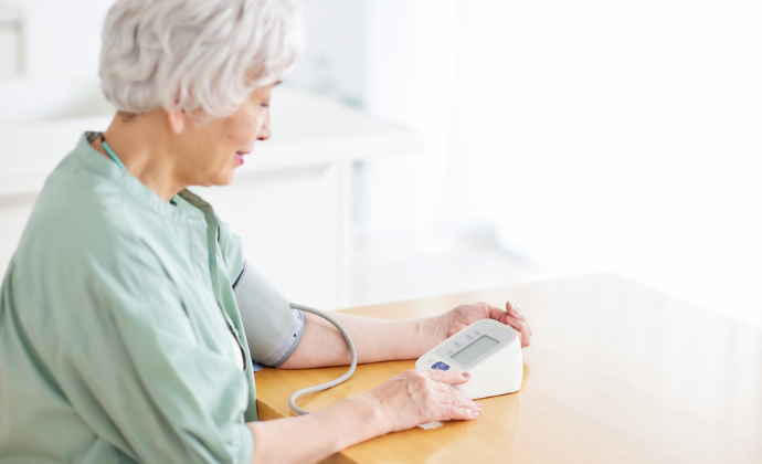 Lady taking blood pressure