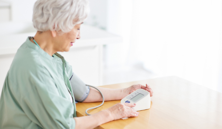 Lady taking blood pressure