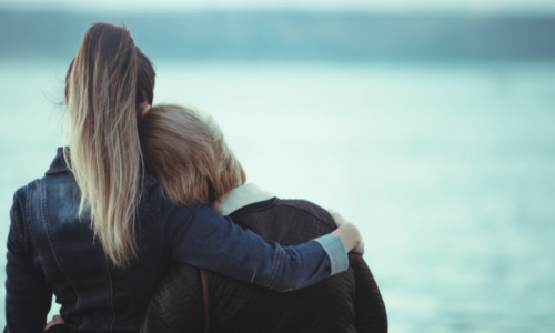 Two women hugging