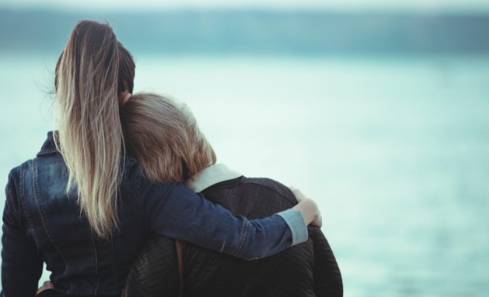 Two women hugging