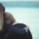 Two women hugging