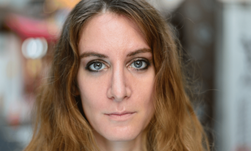 lady staring at camera with no facial expression