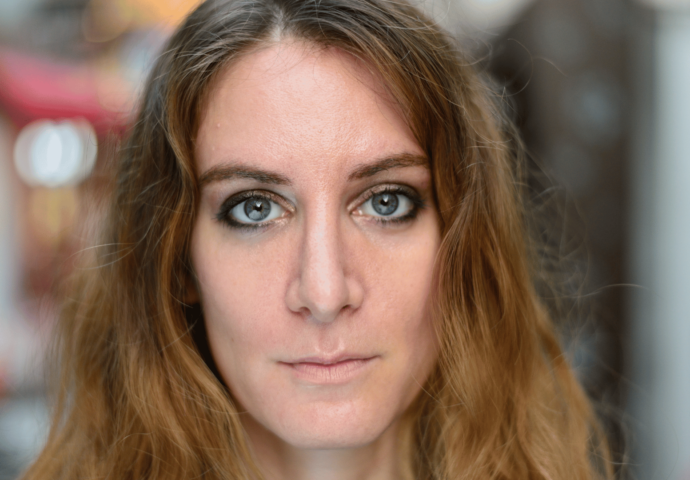 lady staring at camera with no facial expression