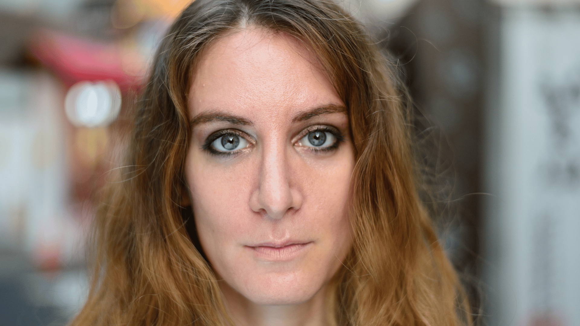 lady staring at camera with no facial expression