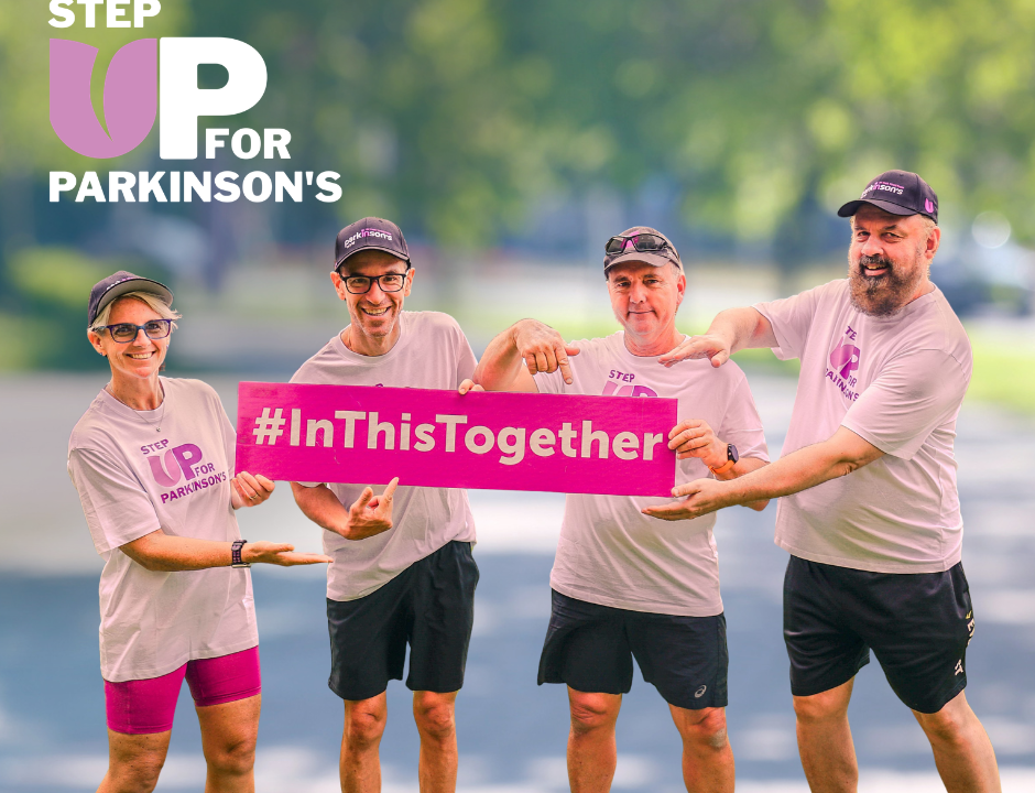 People holding a sign