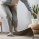 Older person tripping over mat